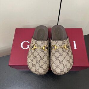 Gucci Women's Tan GG Canvas Mules with Gold Accents